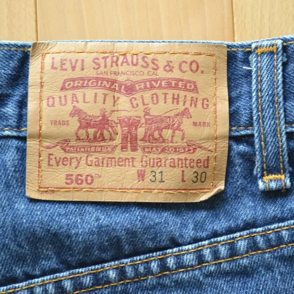 Vintage 90s 560 Levis Cut Off Denim Jean Shorts Size 31